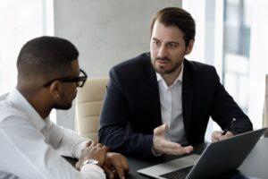 Photo of an established attorney mentoring a first-generation attorney.